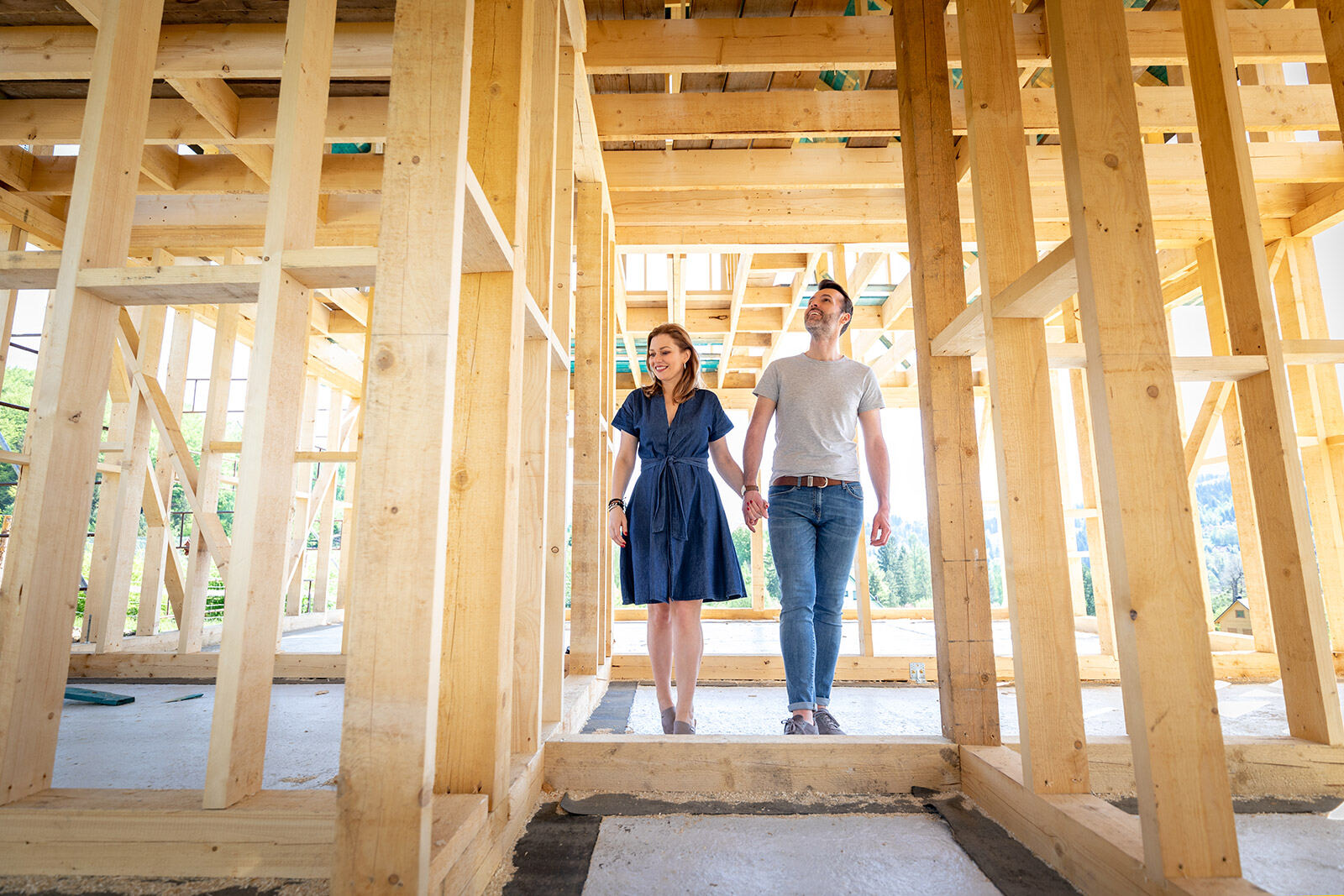 Homeowners visiting their custom home build site